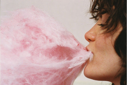 woman eating candyfloss taken on Lomography color negative 800 35mm film